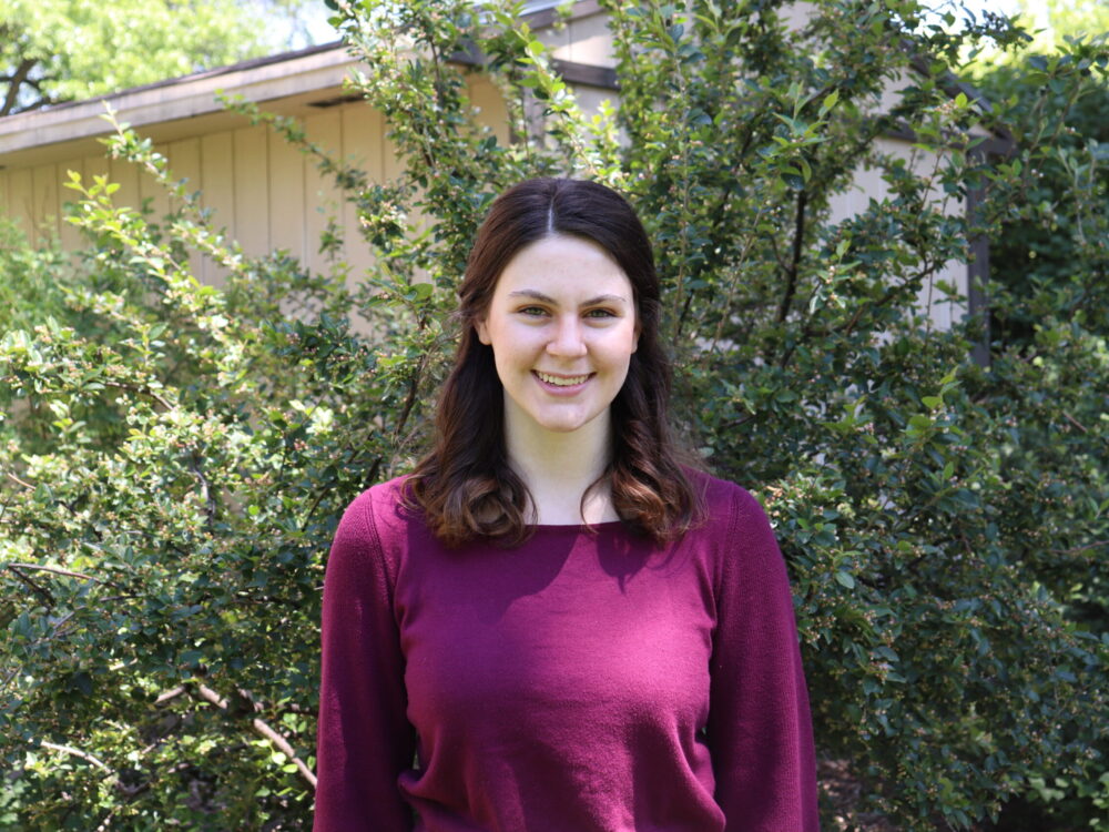 An outdoor portrait of Hannah Burke